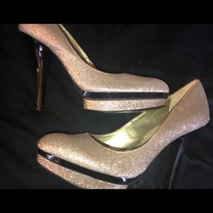 Gold glitter heels...